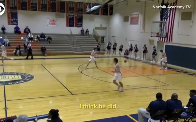 A High School Basketball Player Shoots a Three, and Does a Backflip