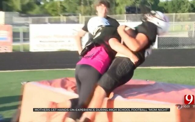 High School Football Team Hosts “Mom Night” Where Moms Suited Up & Tackled Their Sons